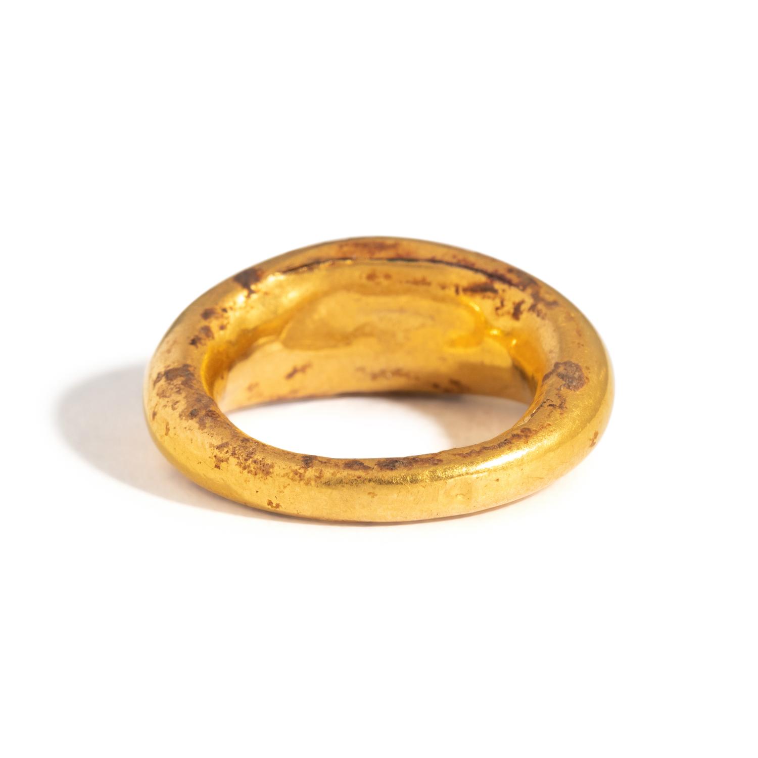 A Roman Gold and Plasma Finger Ring with the God Eros
