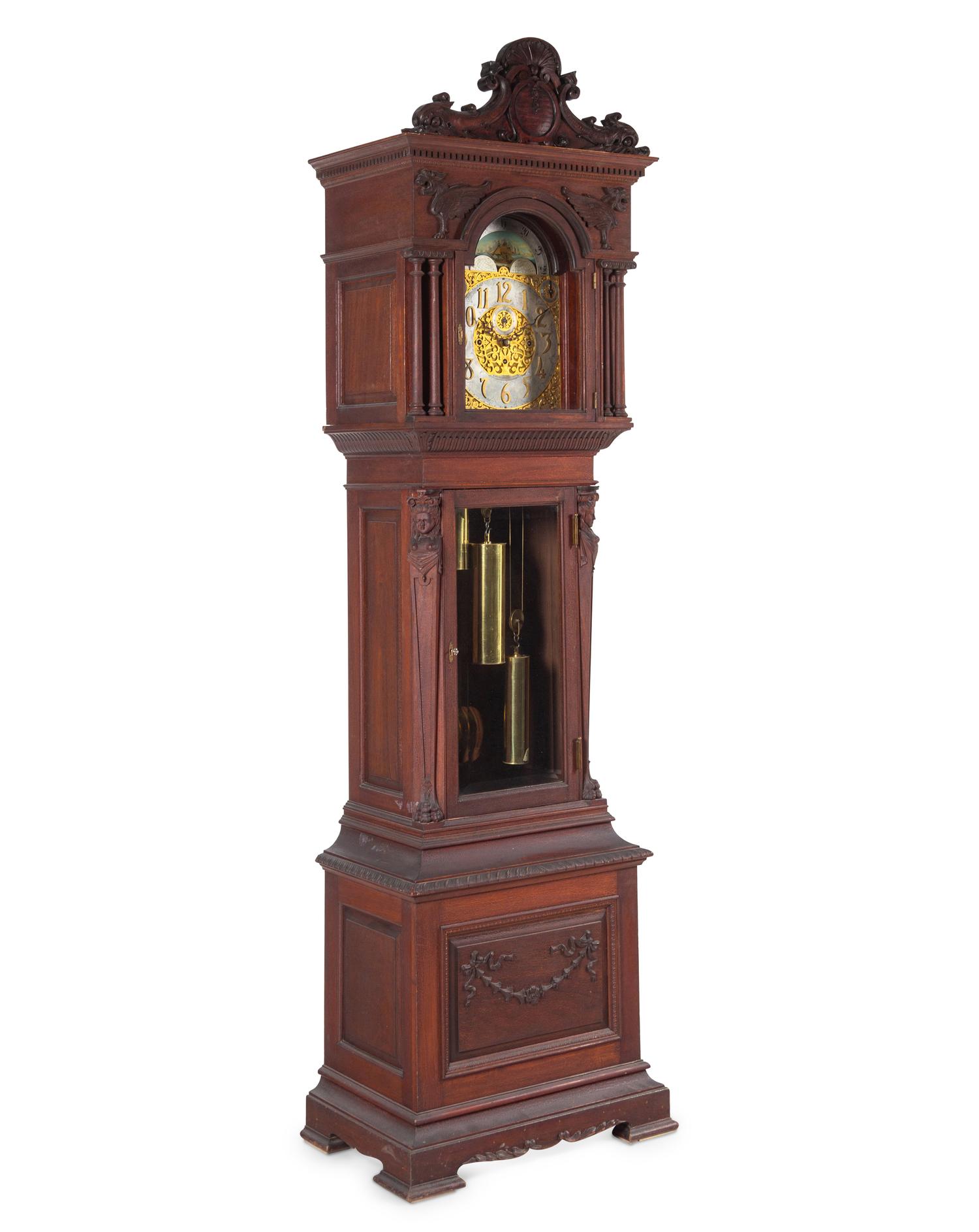 A Renaissance Revival Carved Walnut Tall Case Clock