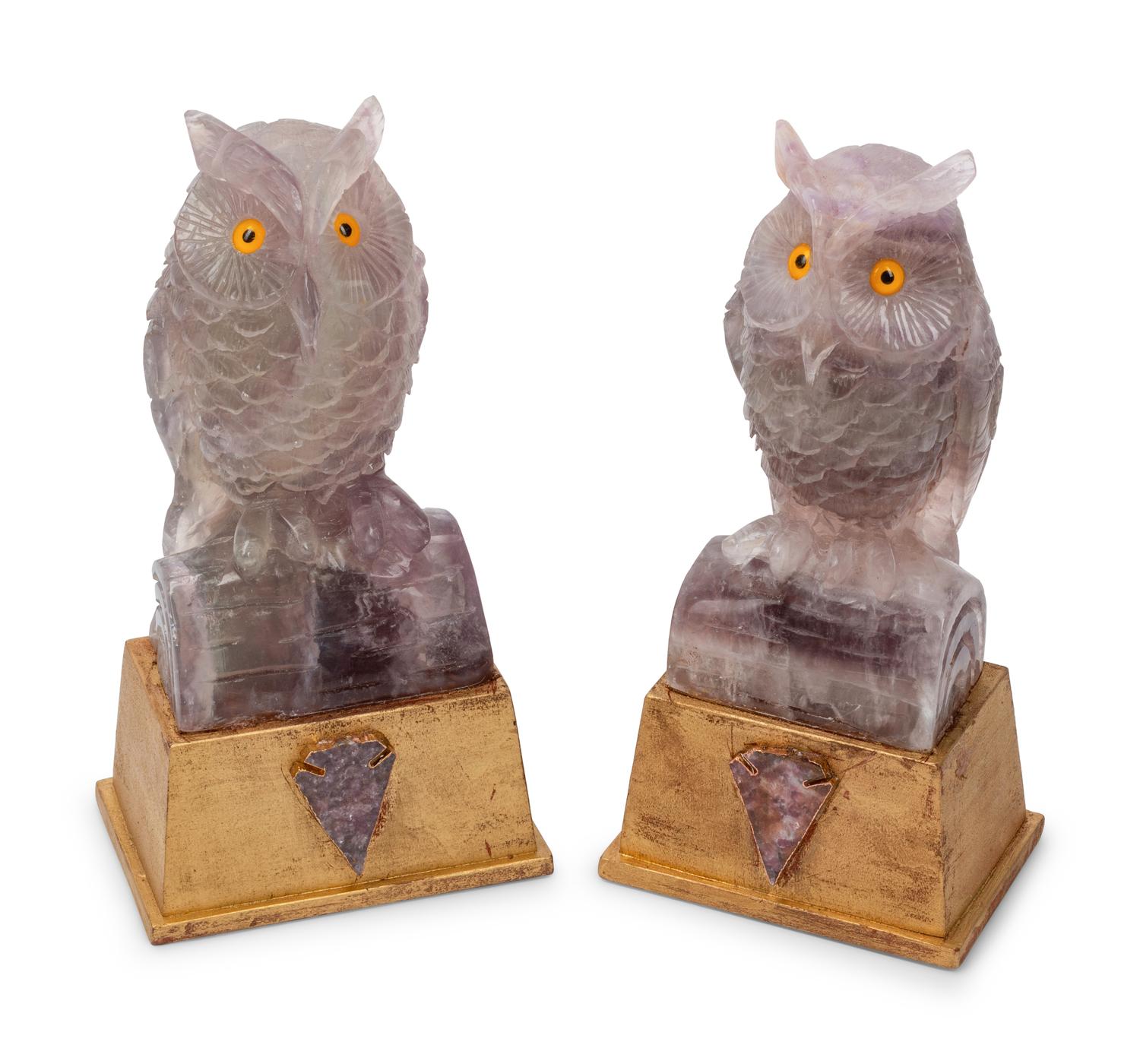 A Pair of Carved Amethyst Owls with Carved Wood Bases