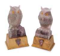 A Pair of Carved Amethyst Owls with Carved Wood Bases