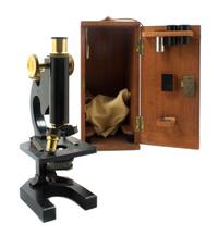 An English Brass and Black Lacquered Microscope Height 11 inches. — R. & J. BECK LTD., LONDON, EARLY 20TH CENTURY