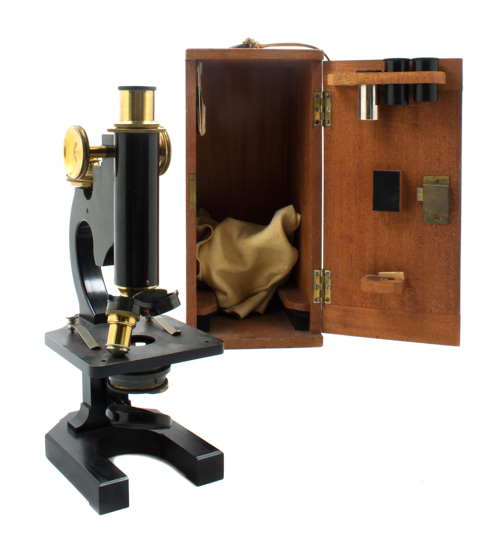 An English Brass and Black Lacquered Microscope Height 11 inches. — R. & J. BECK LTD., LONDON, EARLY 20TH CENTURY
