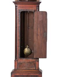 A Chippendale Inlaid and Figured Mahogany Tall Case Clock