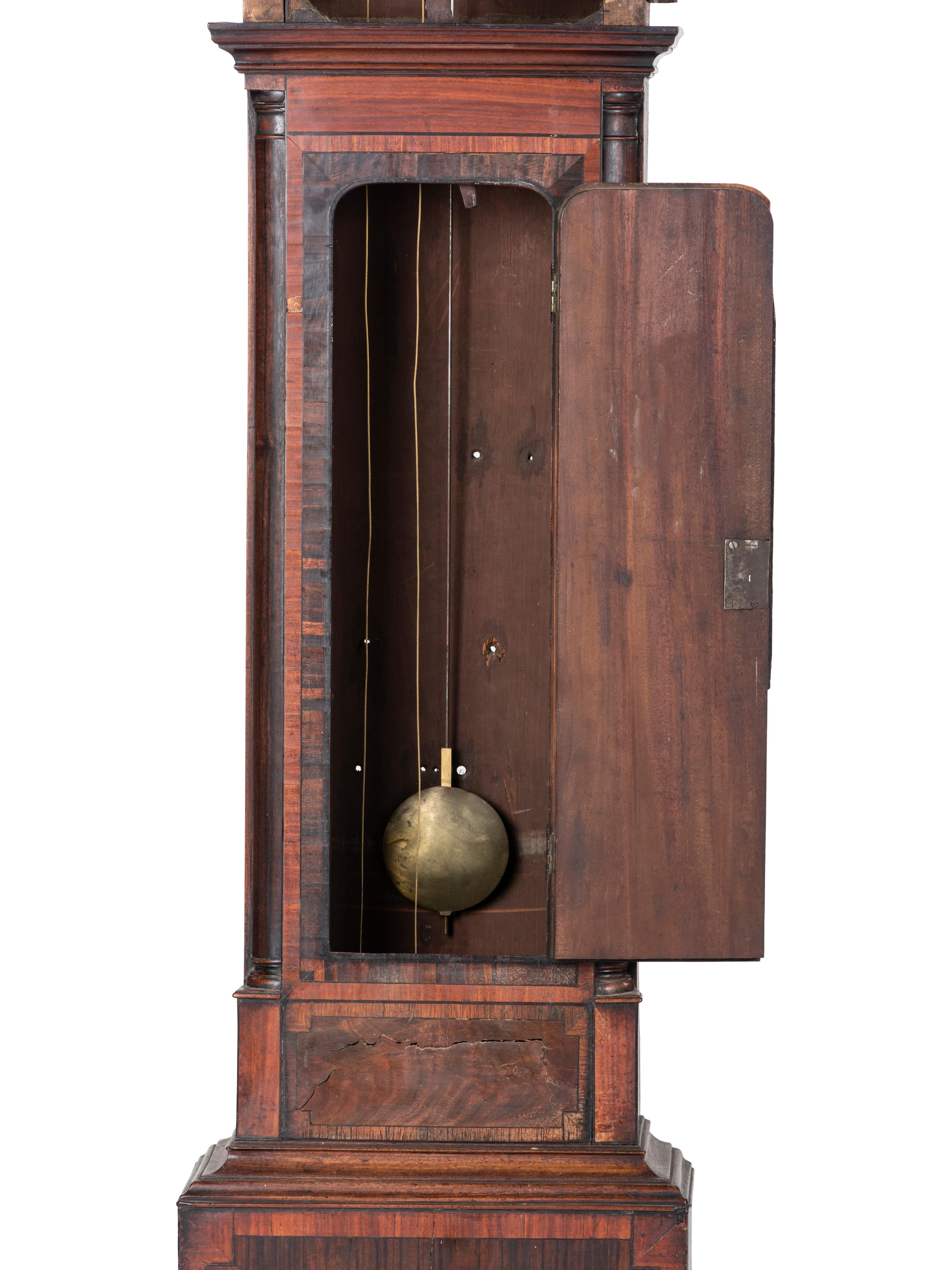 A Chippendale Inlaid and Figured Mahogany Tall Case Clock