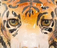 A Group of Six Italian Glazed Terracotta Feline Head Wall Mounts