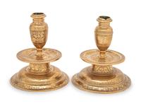 A Pair of Venetian Gilt Bronze Candlesticks