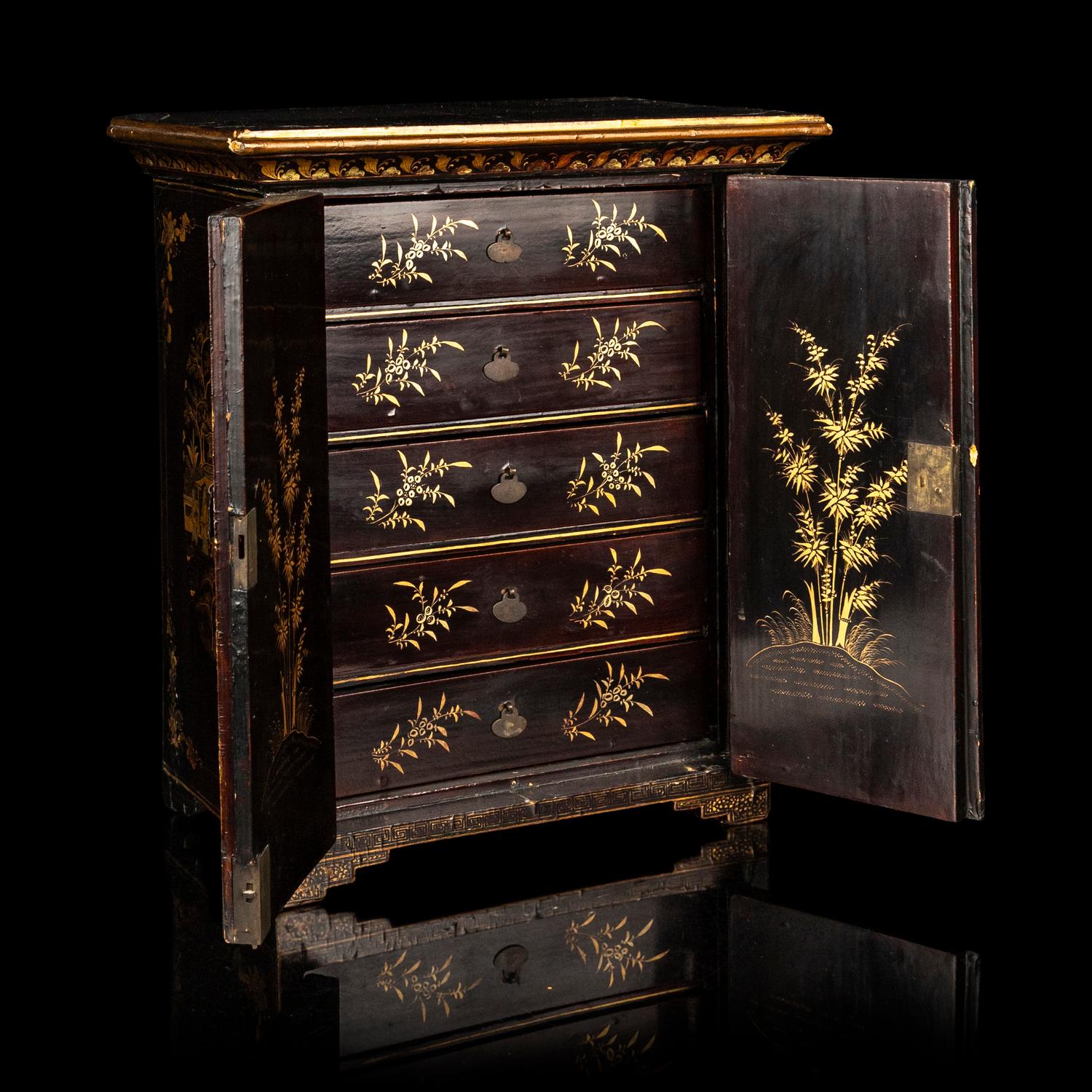 A Chinese Export Gilt Decorated Black Lacquered Chest