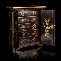 A Chinese Export Gilt Decorated Black Lacquered Chest