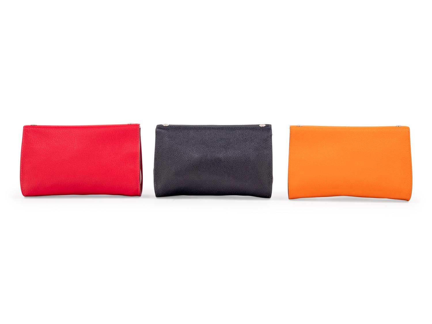 Three Hermès Leather Karo Trousse Cosmetic Bags, 2000-2013