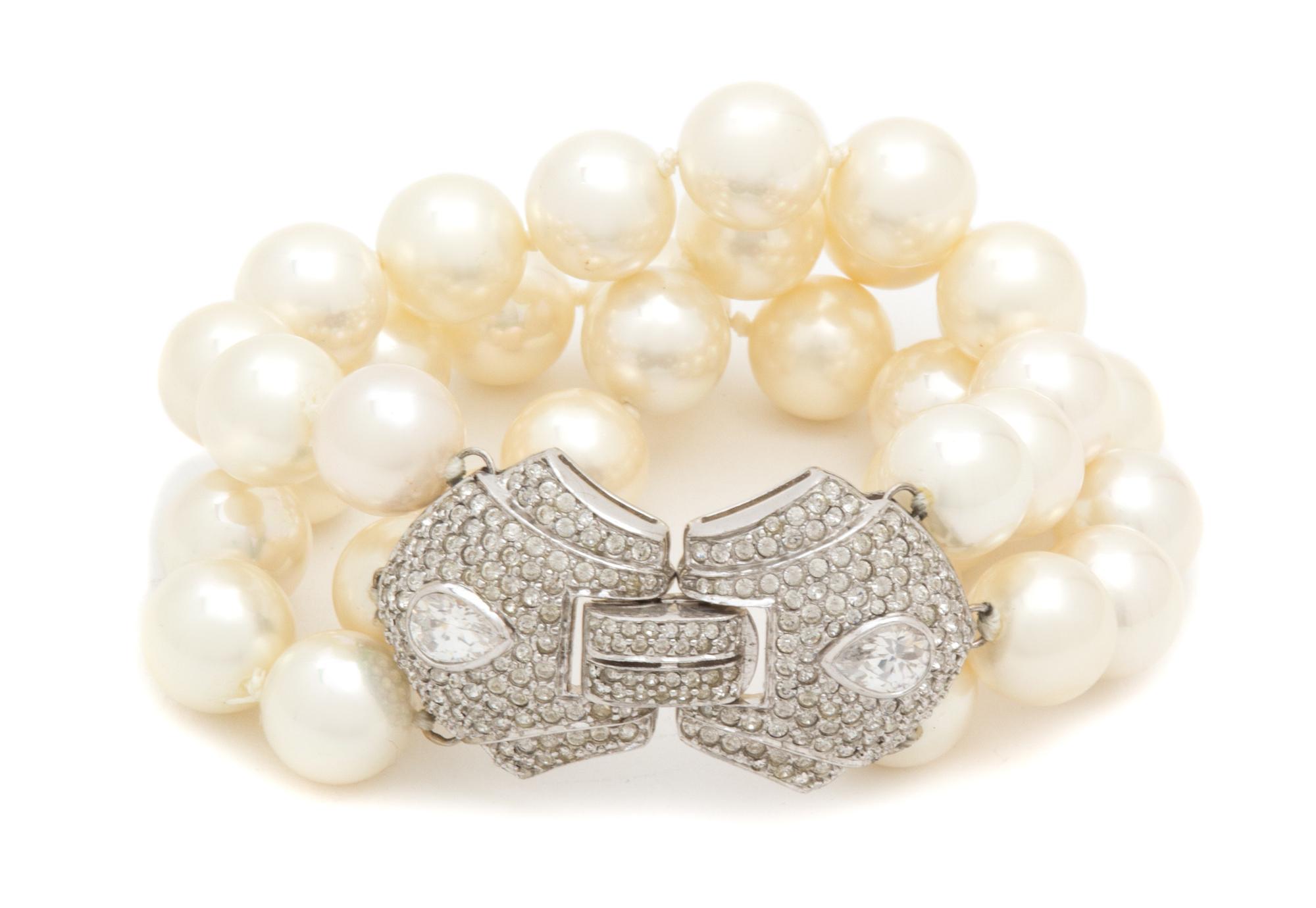 A Triple Strand Faux Pearl Demi Parure, Necklace: 22" x 1.5"; Bracelet: 8" x 1.5".