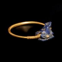 A Phoenician Gold Finger Ring with Blue Glass Frog Seal