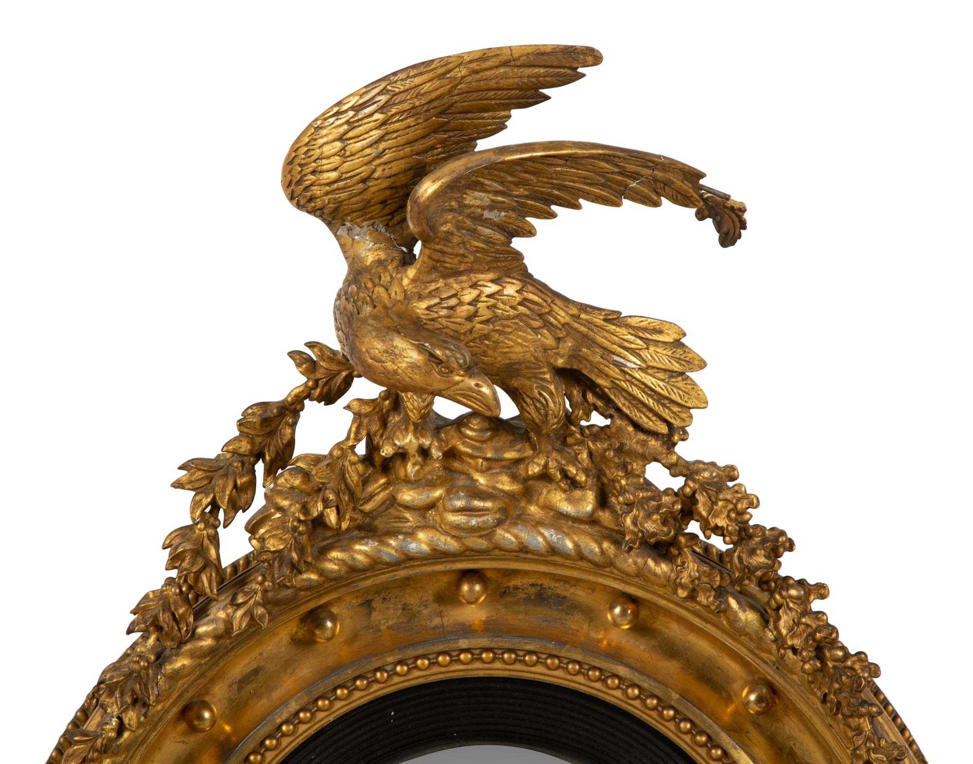 A Regency Giltwood Convex Girandole Mirror