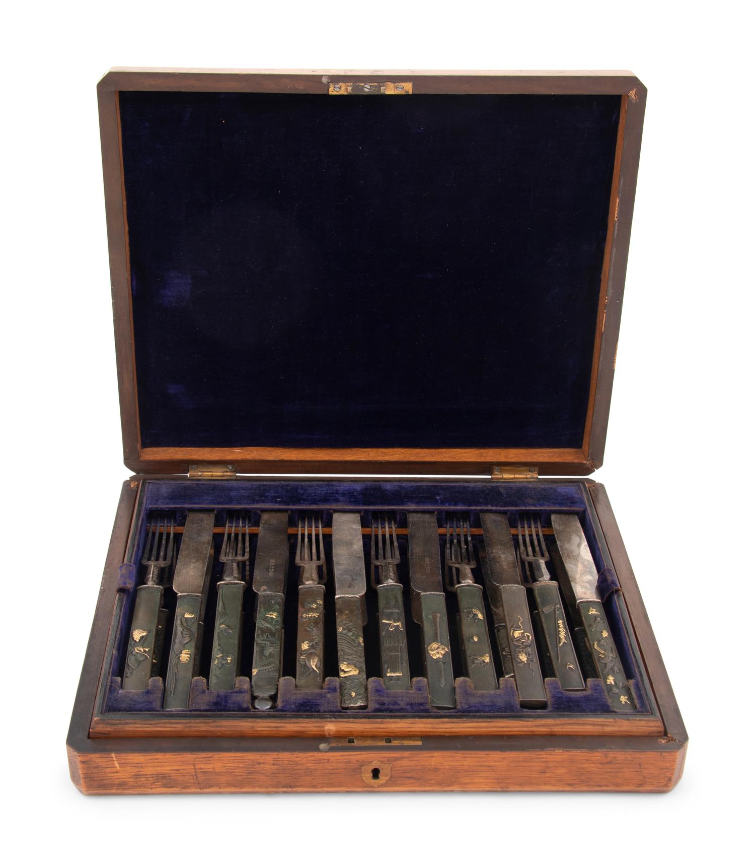 A Cased Japanese Silver Kozuka Fish Service