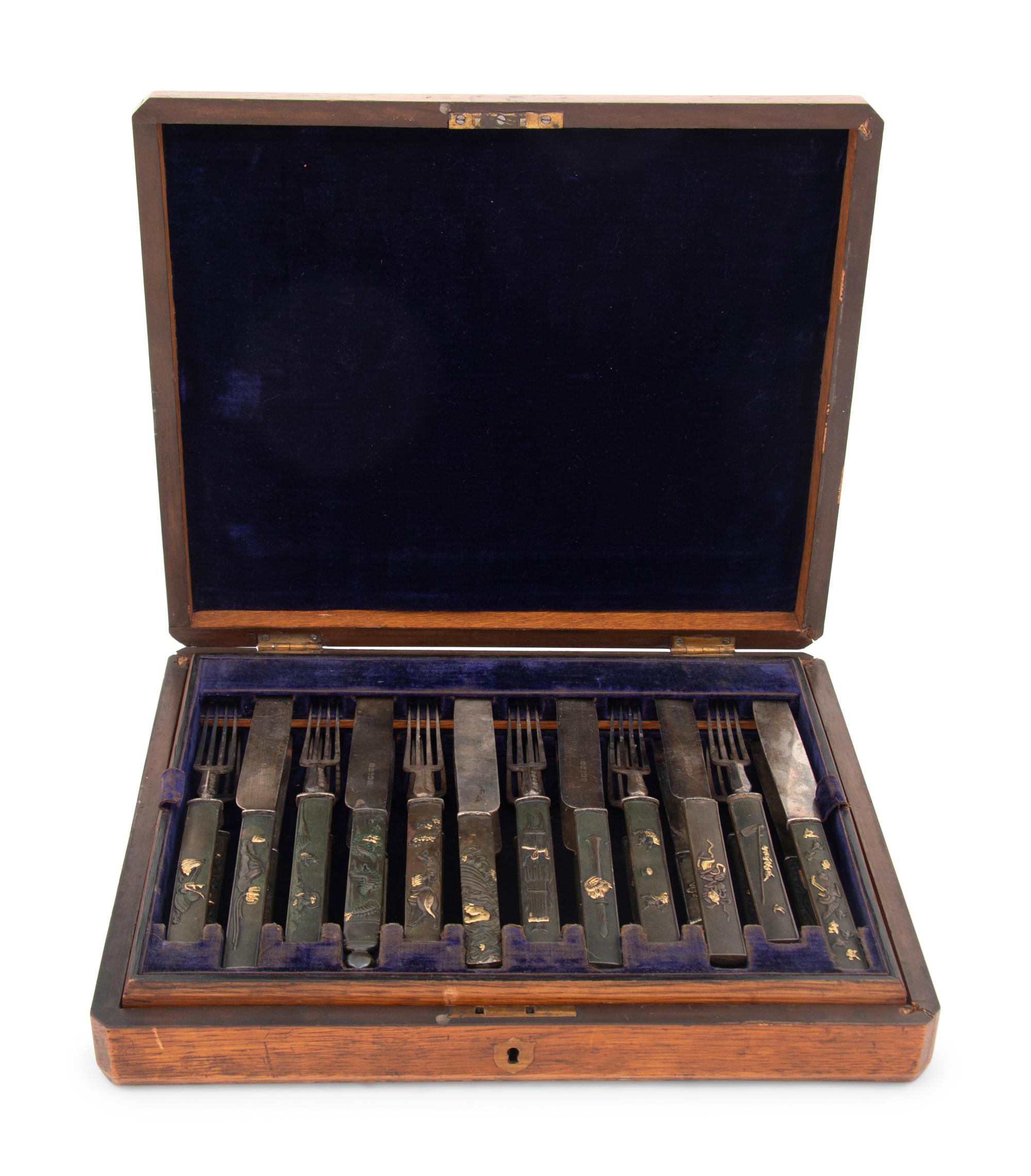 A Cased Japanese Silver Kozuka Fish Service