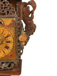 A Dutch Carved and Painted Wall Clock
