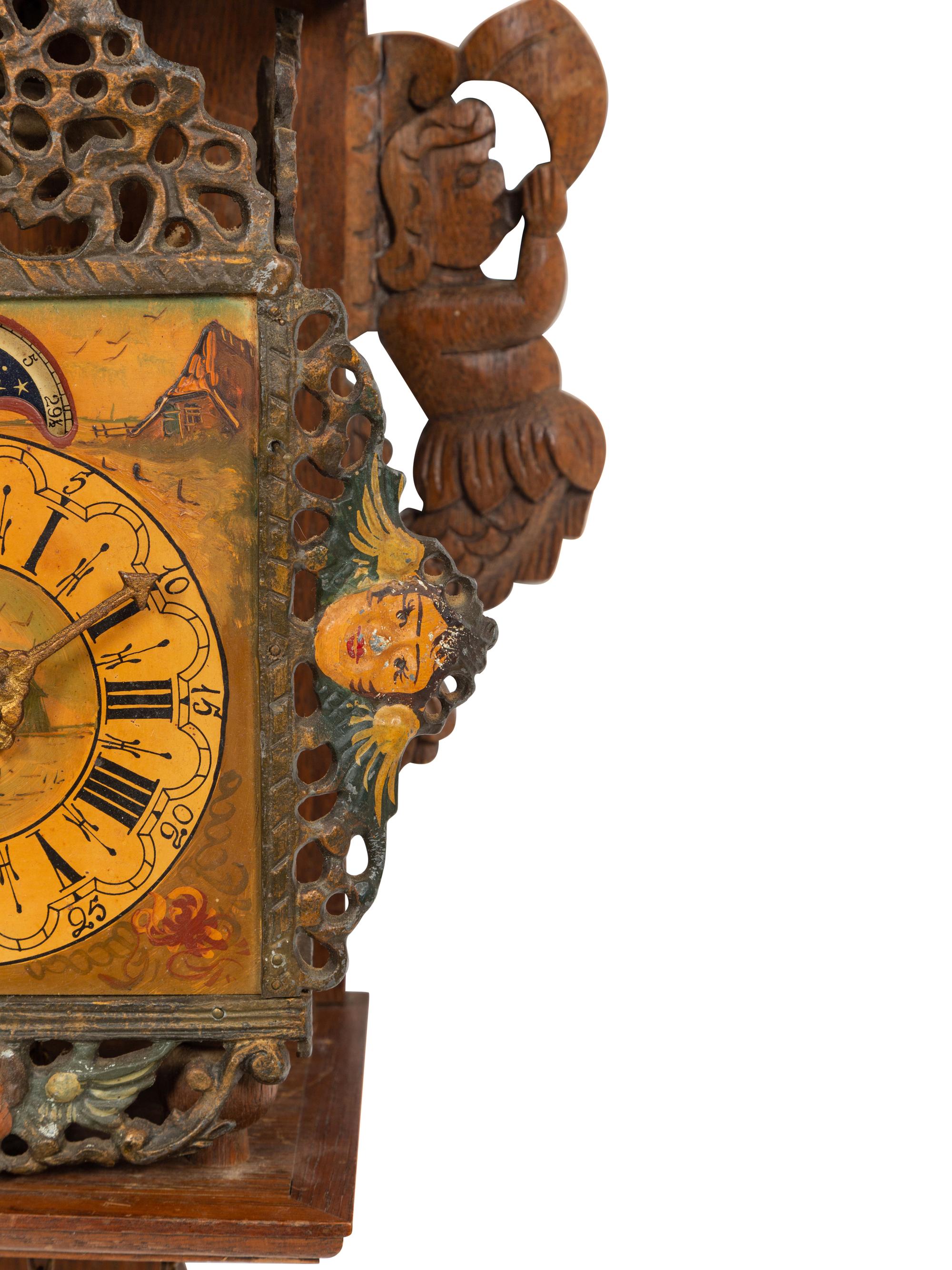A Dutch Carved and Painted Wall Clock