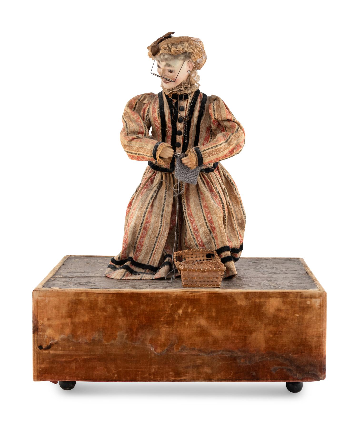 A Knitter Automaton on Base
