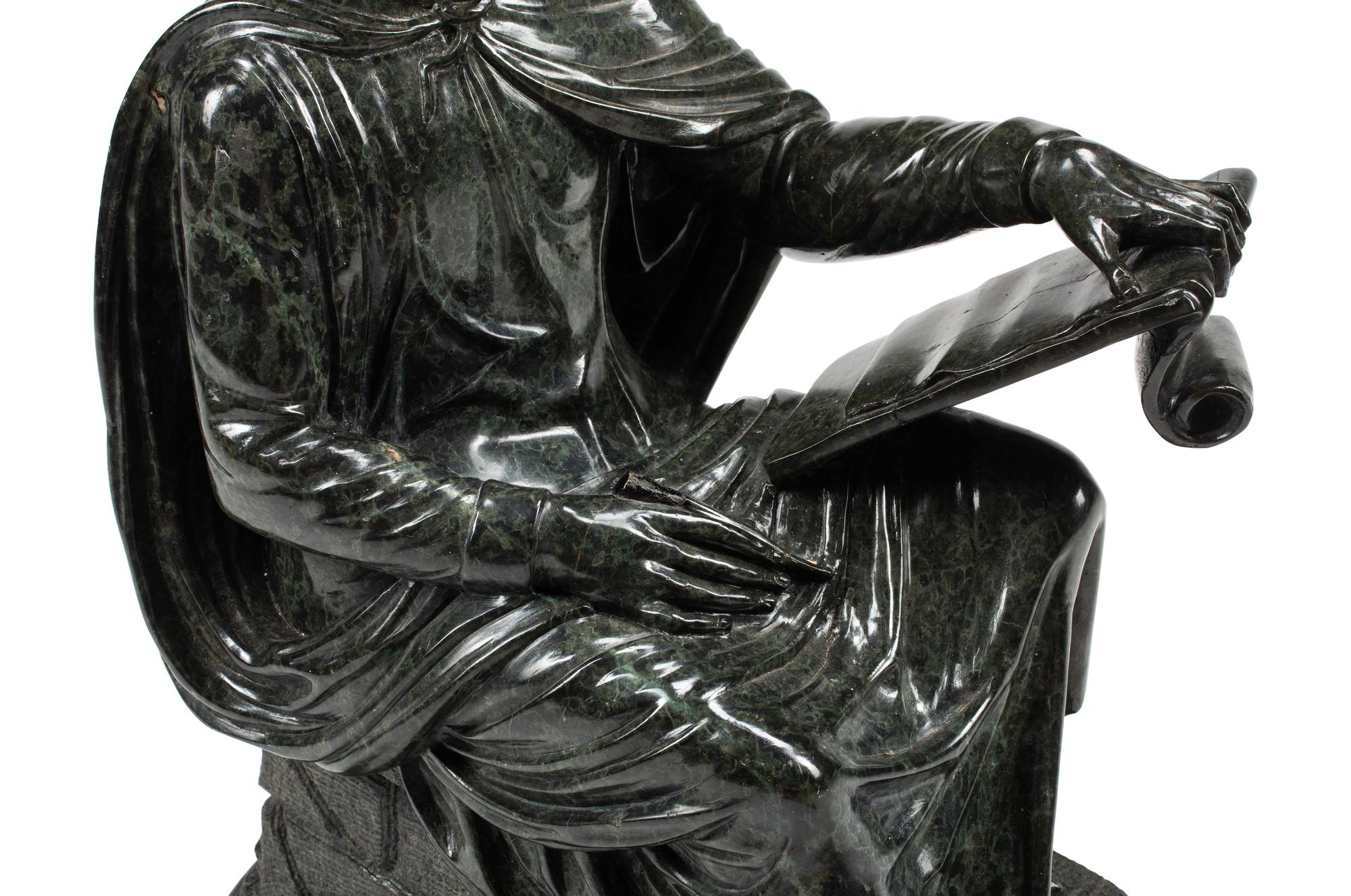A French Carved Green Marble Figure of a Scholar