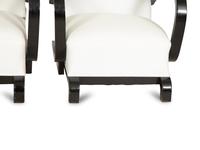 A Pair of Ebonized Oak Lounge Chairs