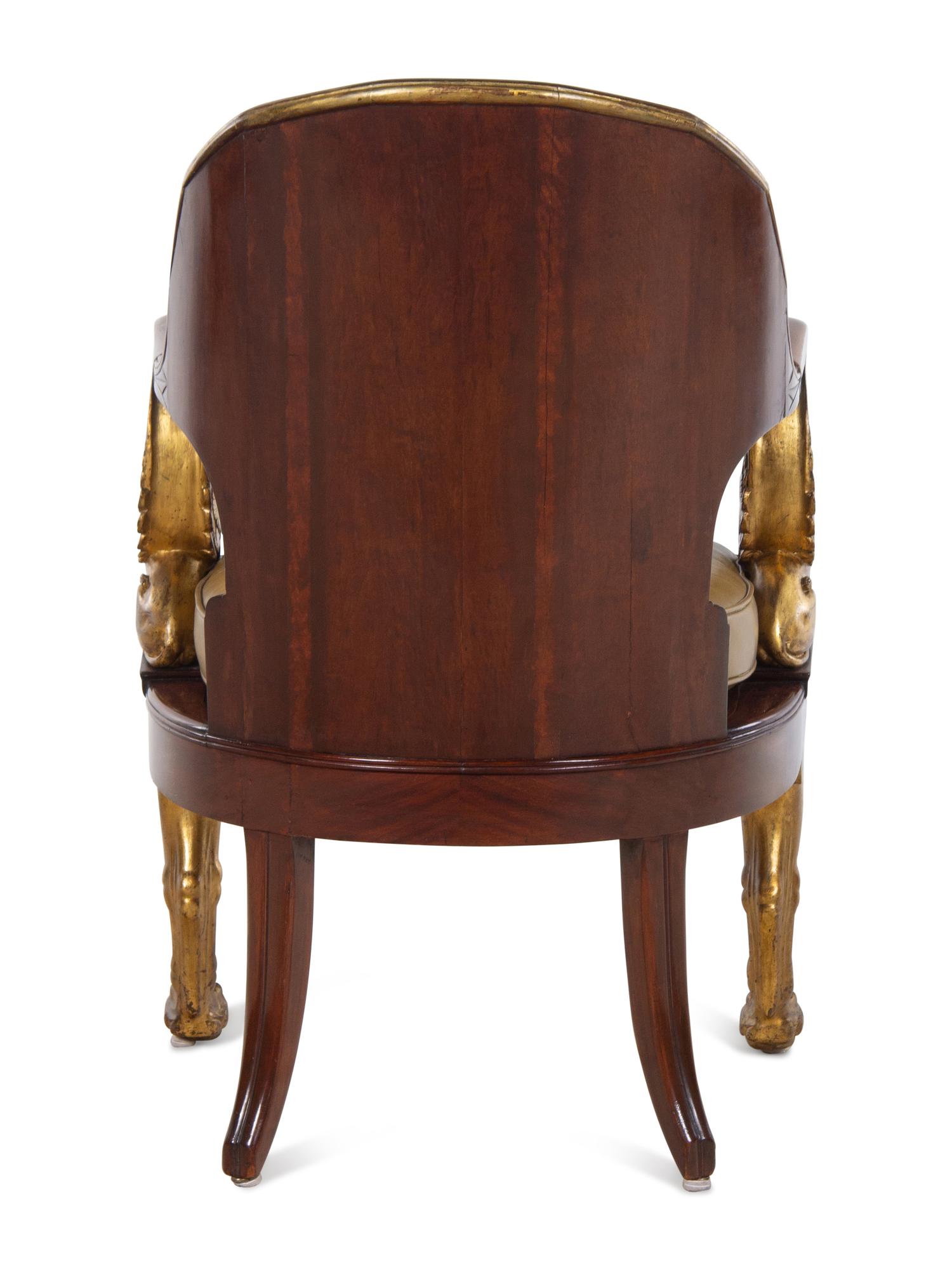 An Empire Parcel Gilt Mahogany Fauteuil