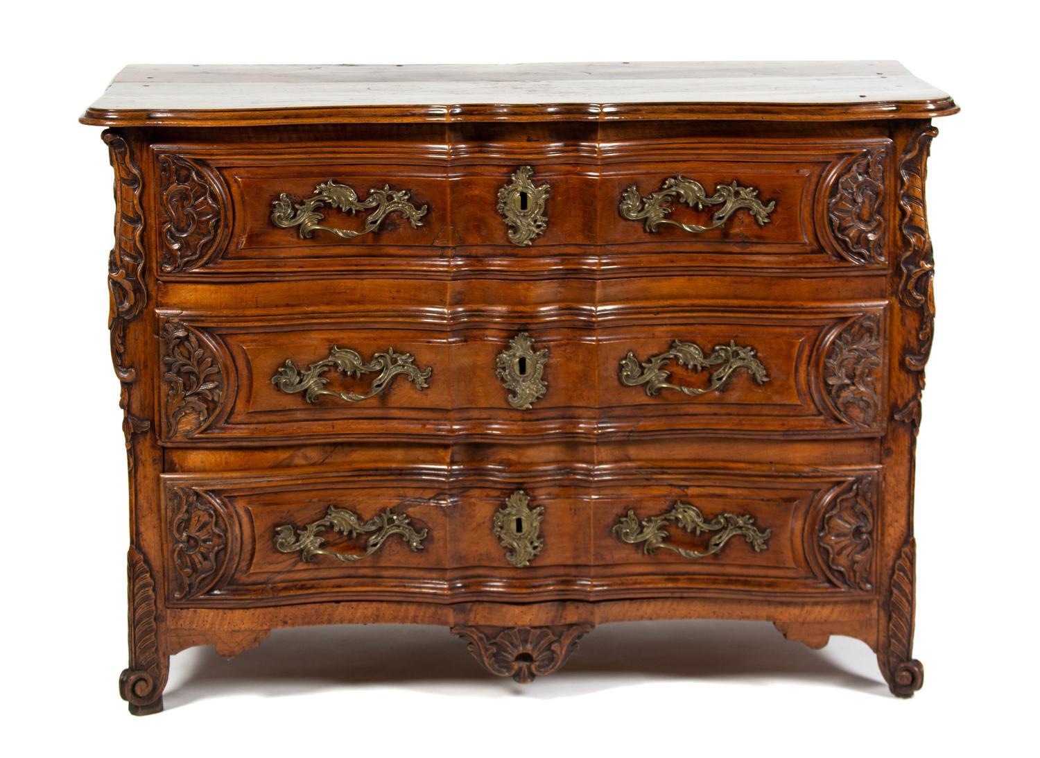 A Louis XV Walnut Provincial Commode Height 38 x width 54 x depth 26 1/2 inches. — 18TH CENTURY