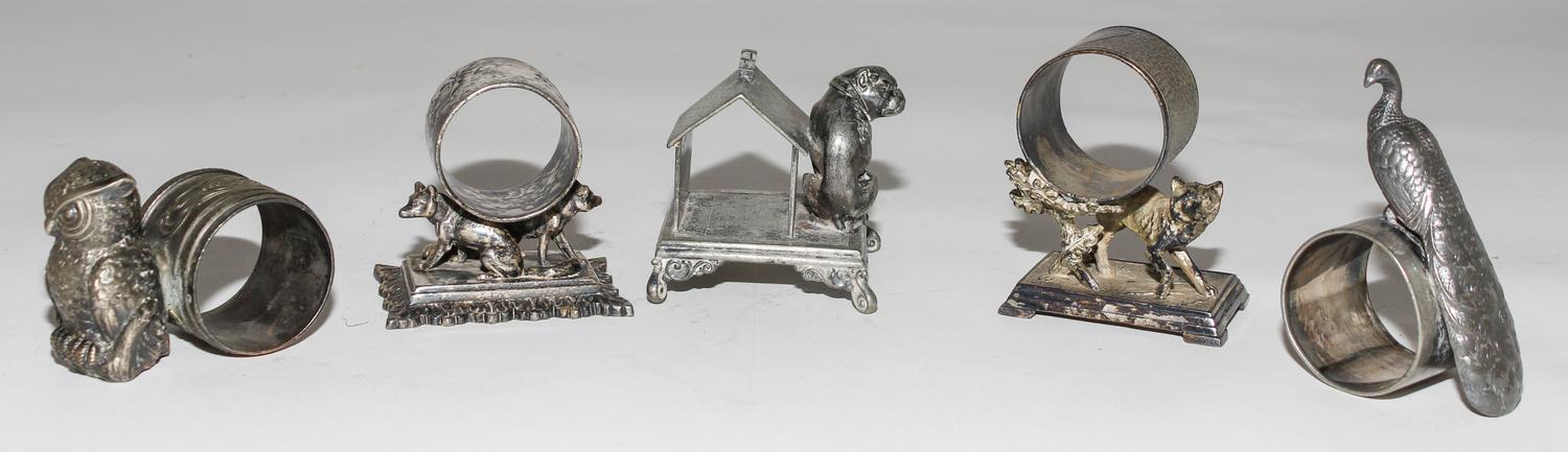 Five Silver-Plate Figural Napkin Rings Height of tallest 3 1/8 inches. — LATE 19TH CENTURY