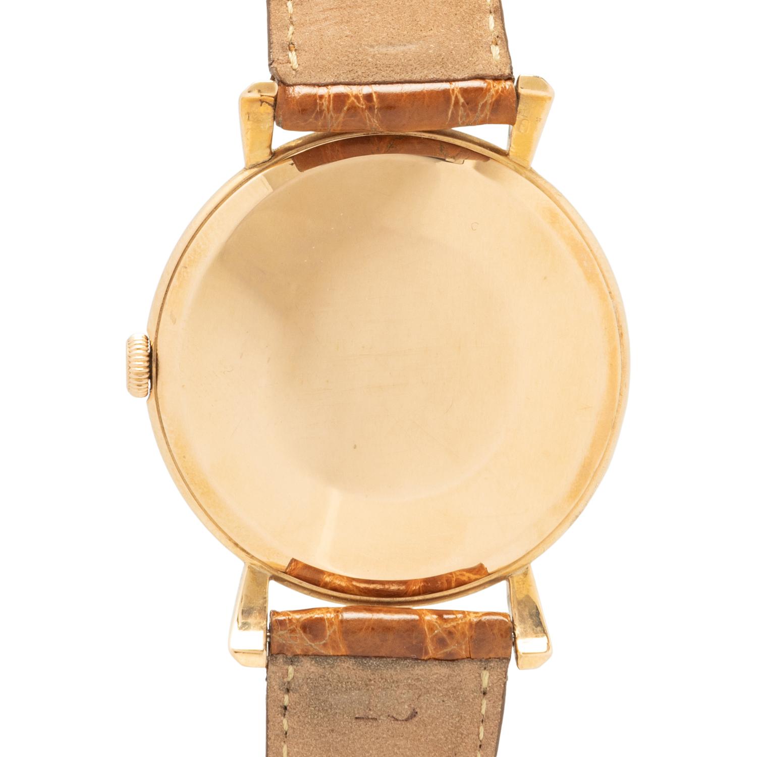 IWC, 18K YELLOW GOLD WATCH WITH FLARED LUGS