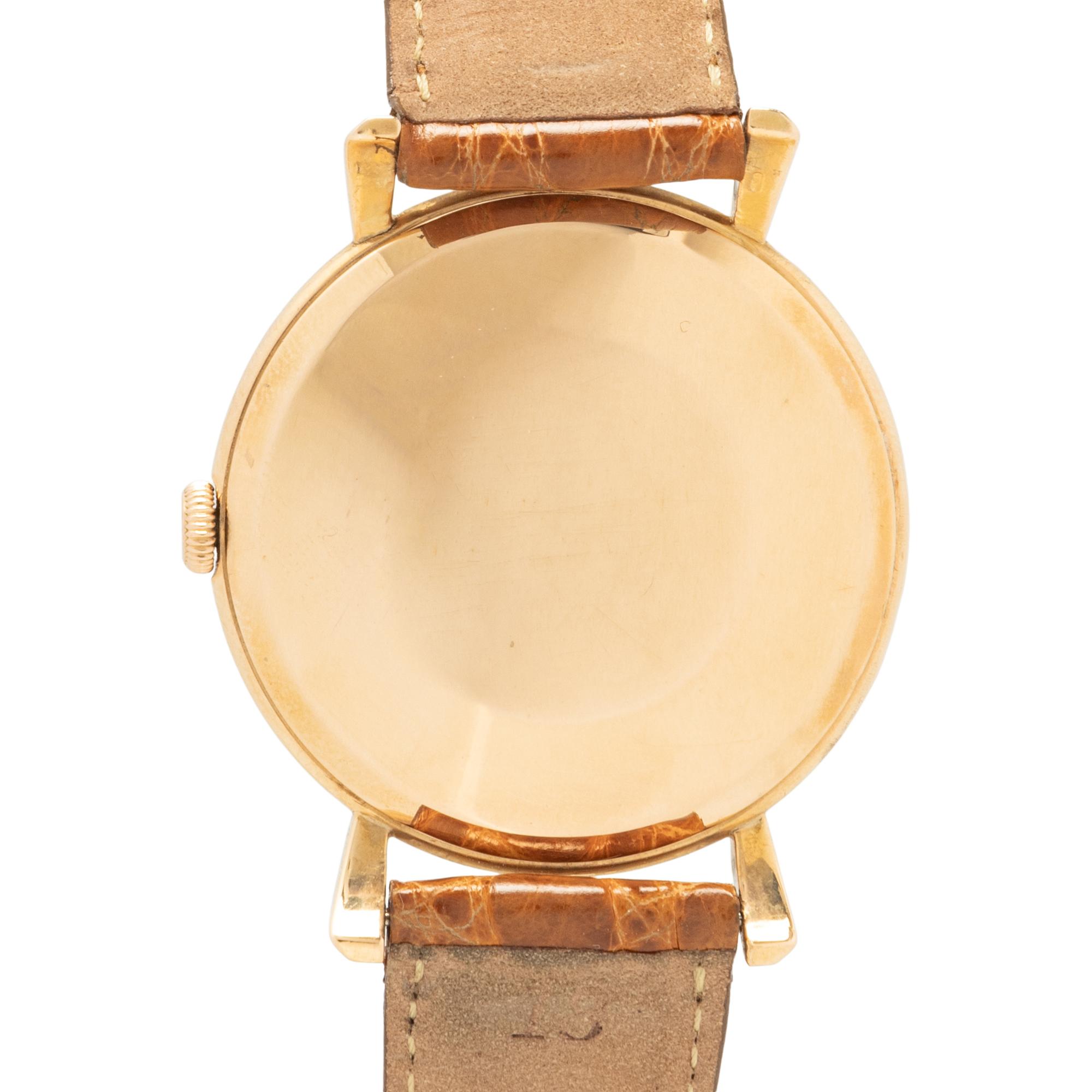 IWC, 18K YELLOW GOLD WATCH WITH FLARED LUGS