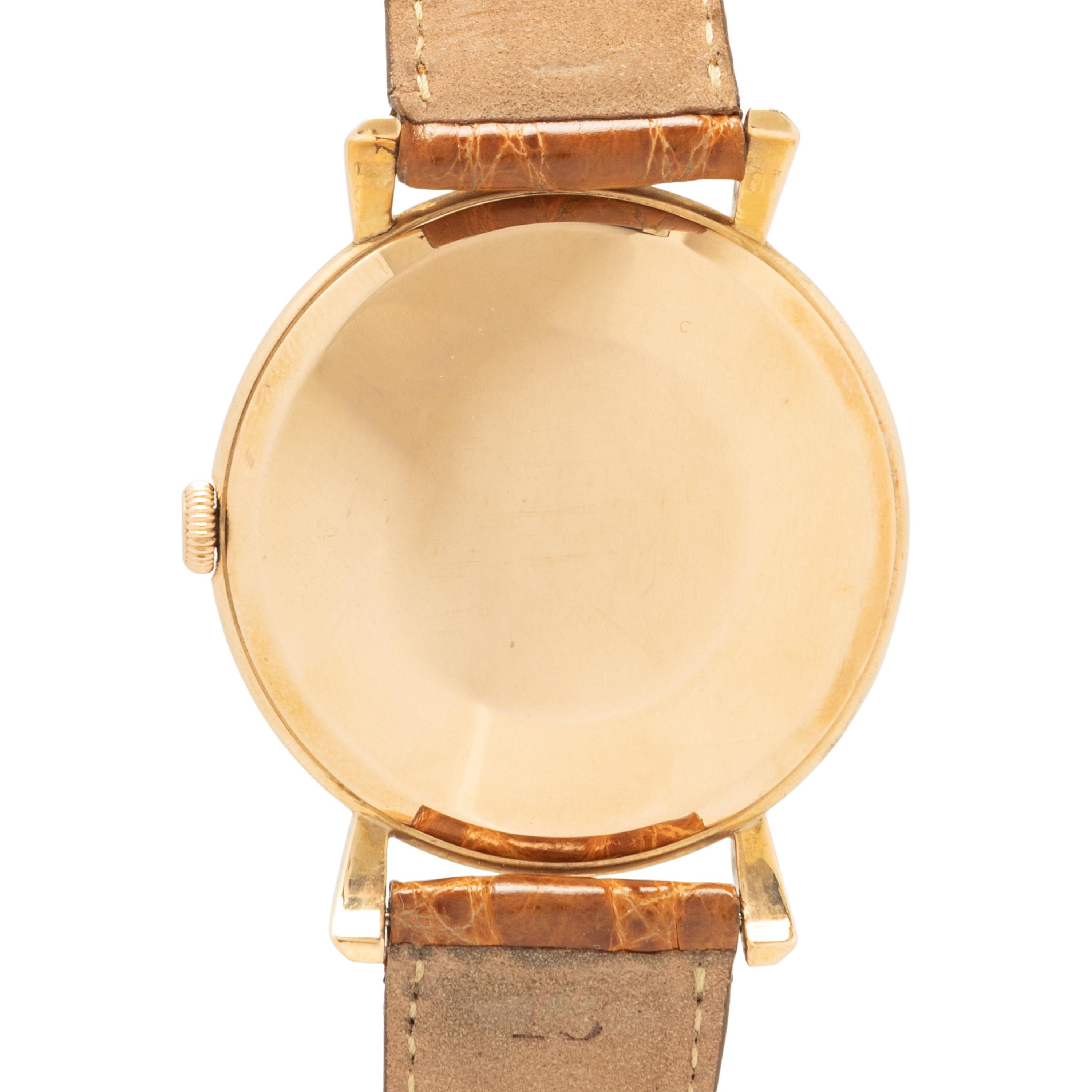 IWC, 18K YELLOW GOLD WATCH WITH FLARED LUGS