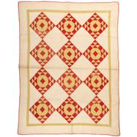 A Diamond Pattern Pieced Quilt