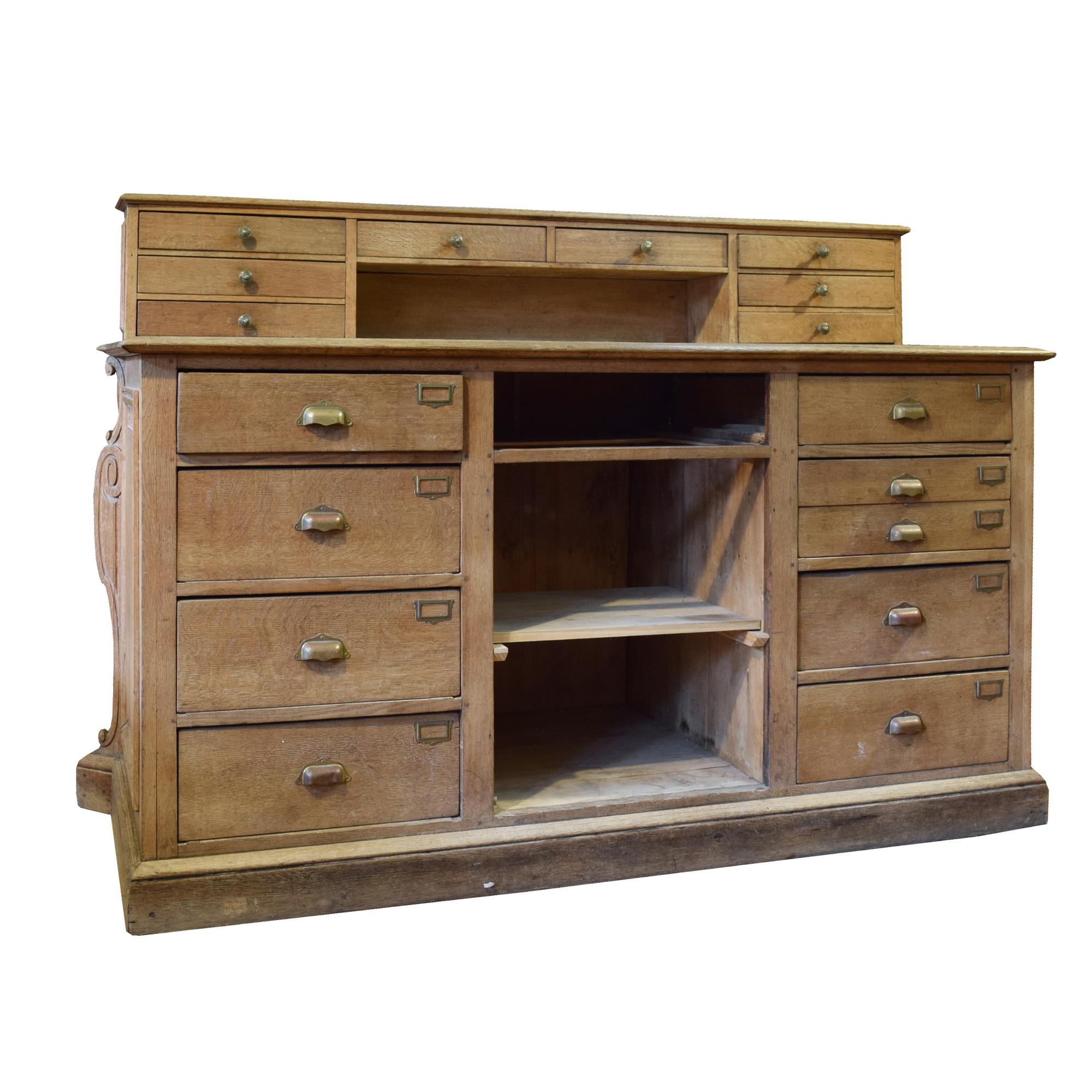 A Carved Oak Shop Counter 73.5" W x 31" D x 51.5" H — France, Late 19th Century