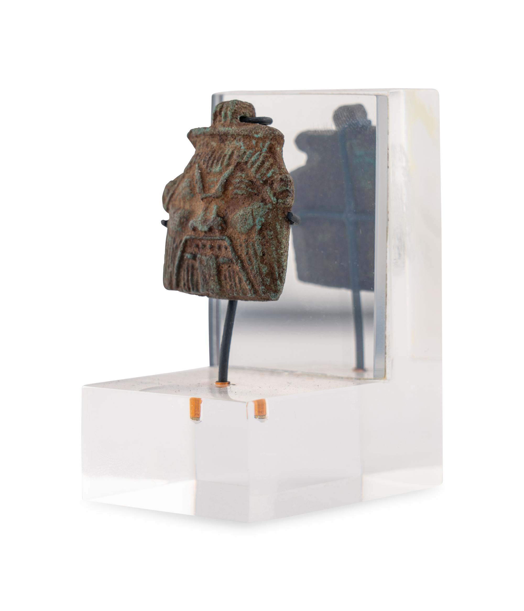 An Egyptian Faience Bes Amulet
