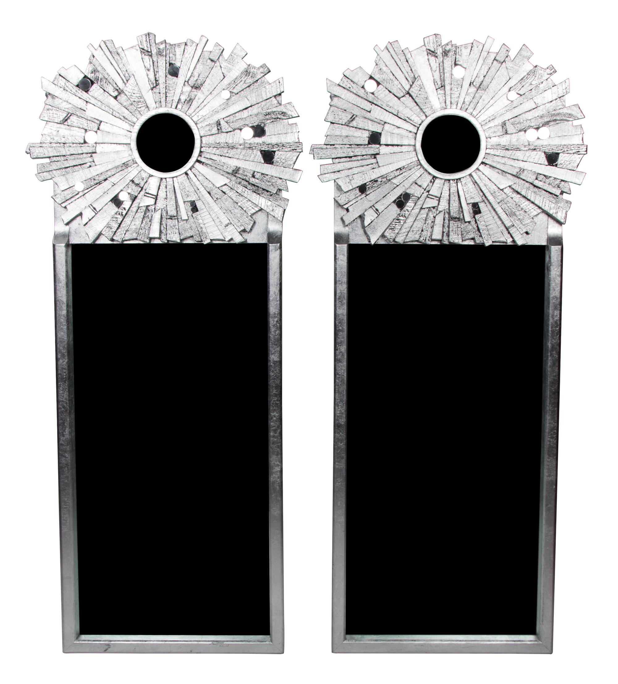 A Pair of Silvered Wood Sunburst Mirrors Height 55 x width 24 inches. — 20TH CENTURY