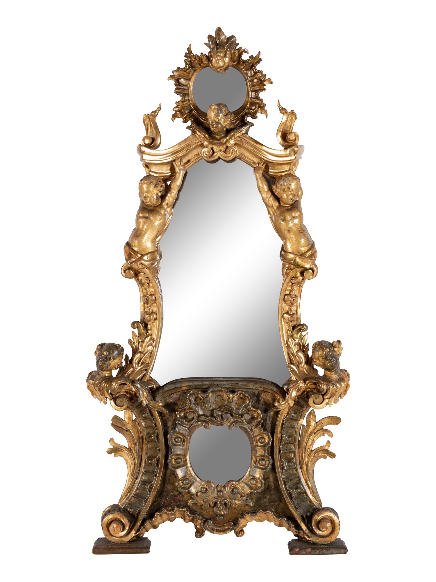 An Italian Rococo Figural Carved Giltwood Mirror