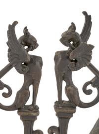A Pair of Neoclassical Cast Metal Candlesticks
