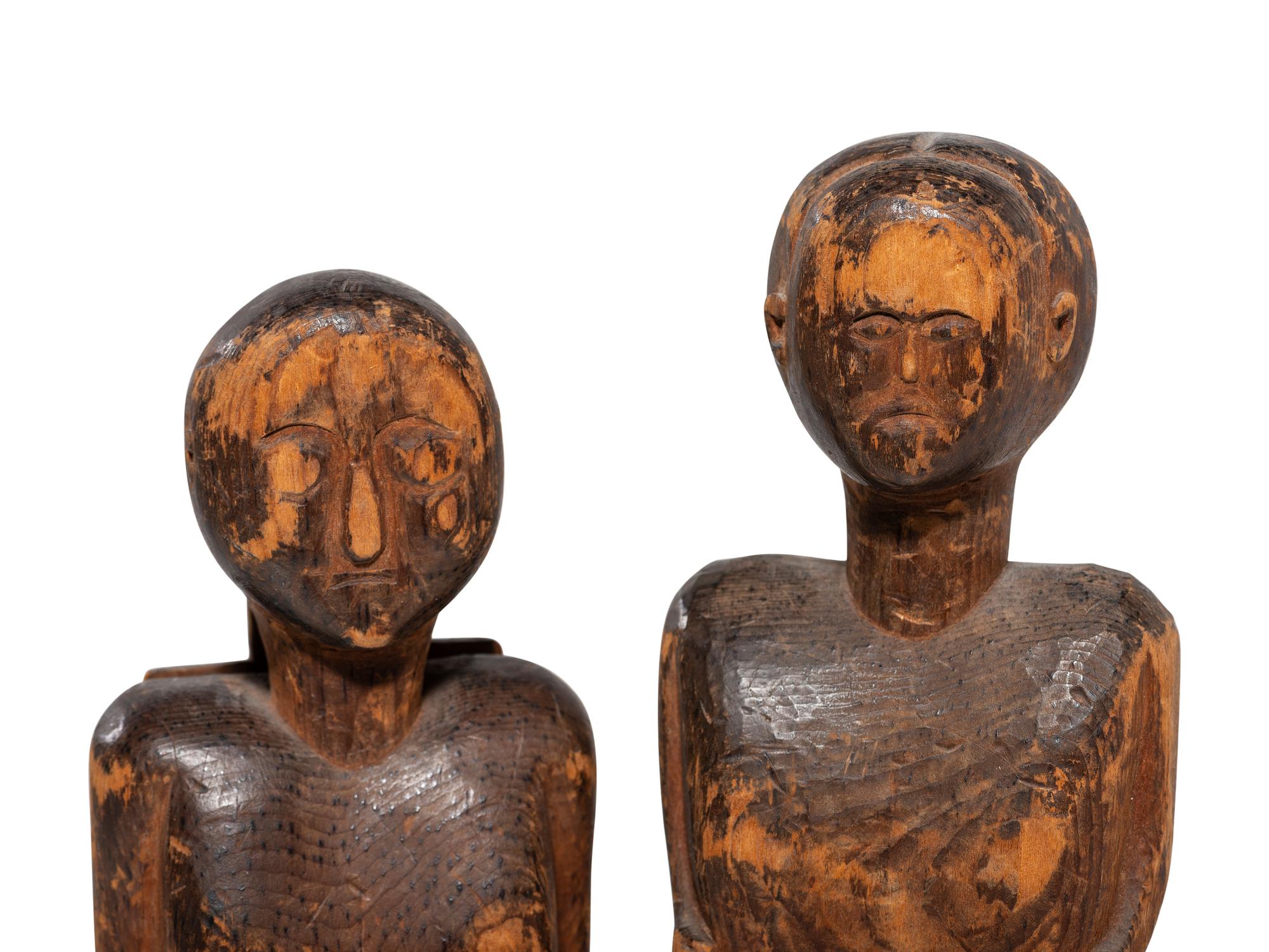 Two Carved Pine "Bedpost" Dolls