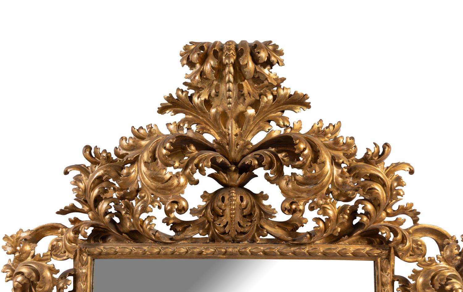A Large Italian Baroque Style Carved Giltwood Mirror
