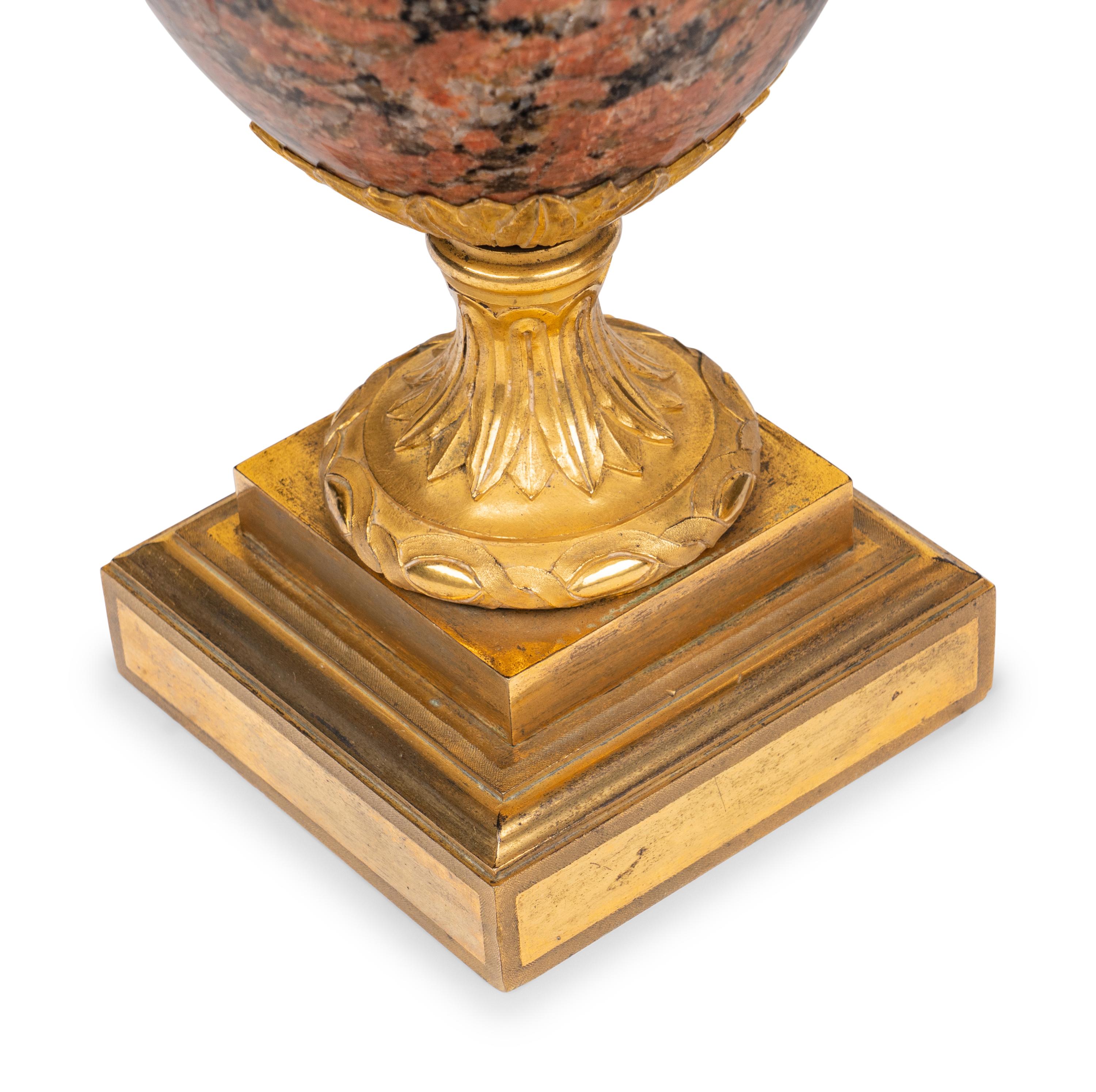 A Pair of Louis XVI Gilt Bronze Mounted Granito Rosso Vases