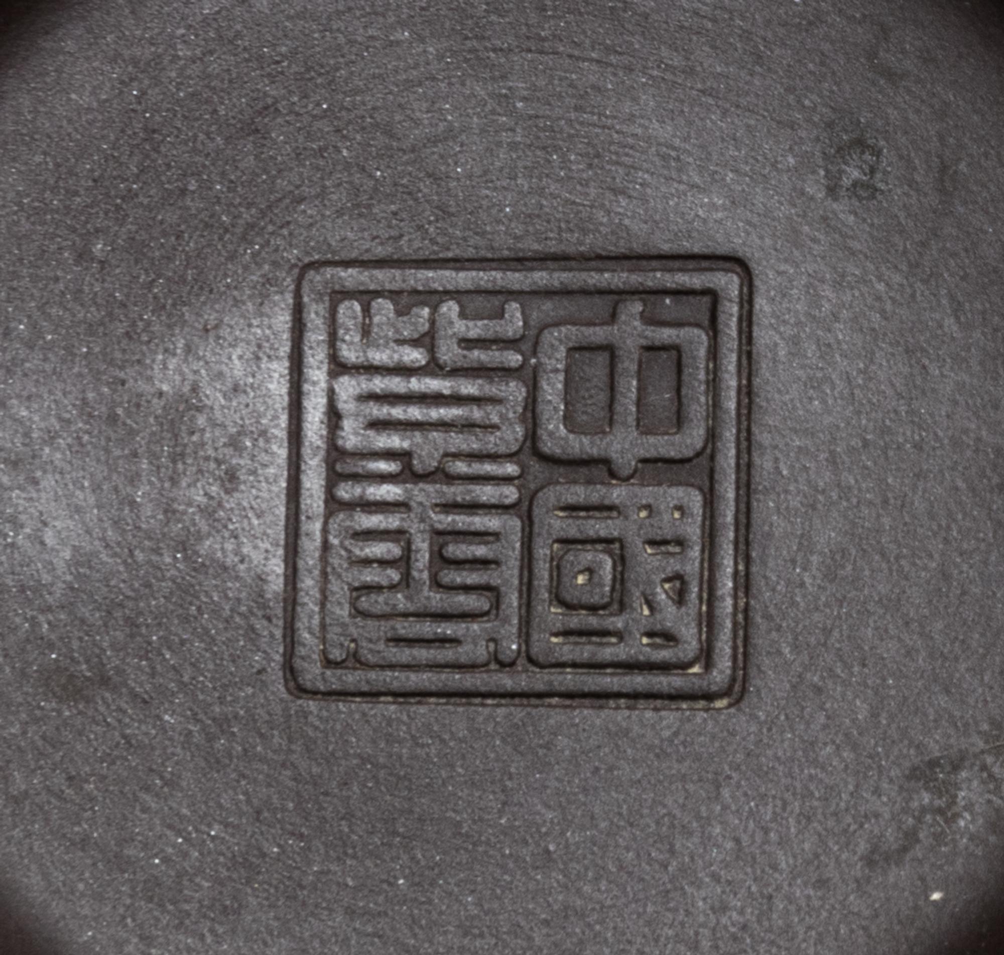 Three Chinese Yixing Pottery Teapots Height of tallest 3 1/2 inches. — 20TH CENTURY