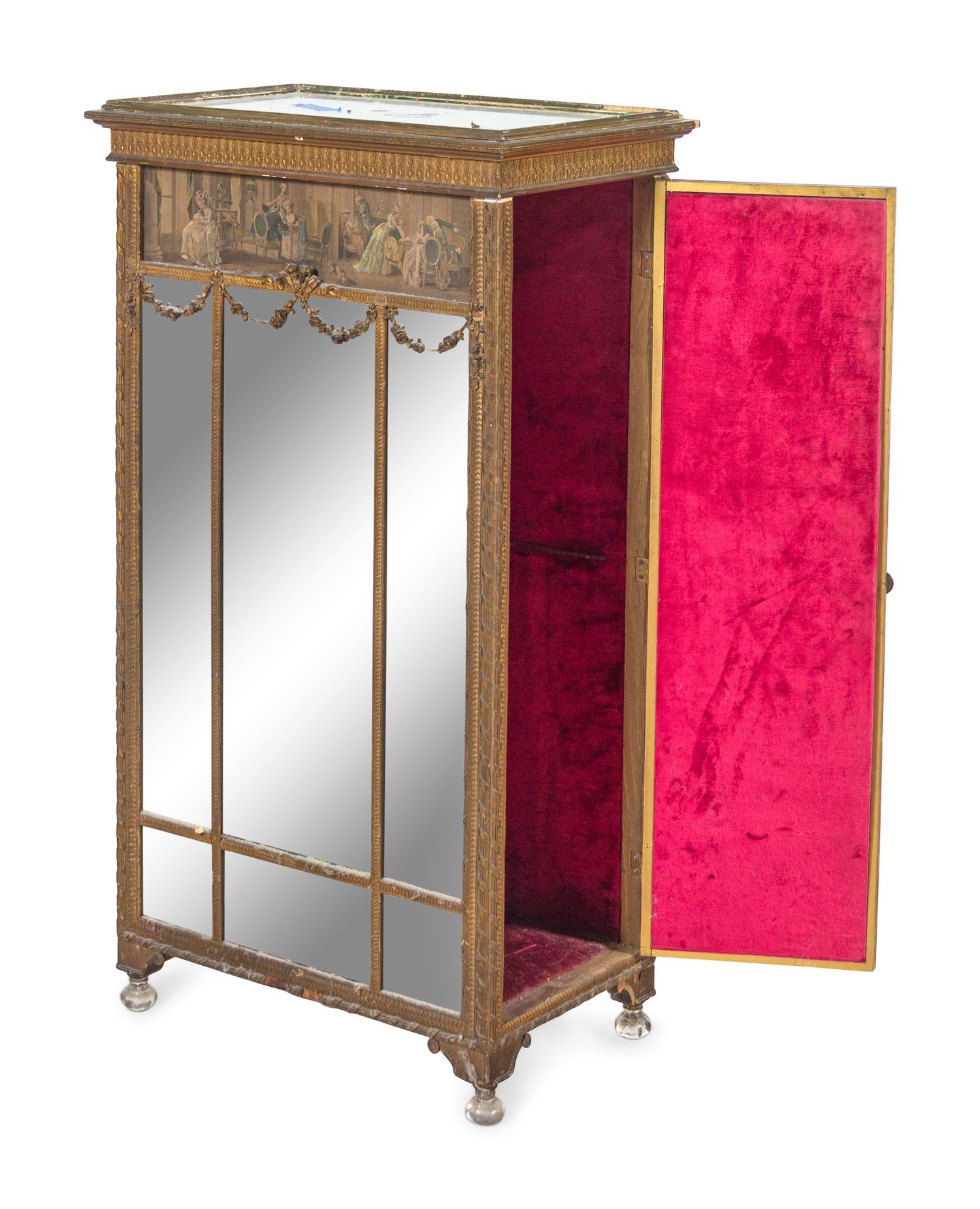 A Louis XVI Style Mirrored Giltwood Cabinet