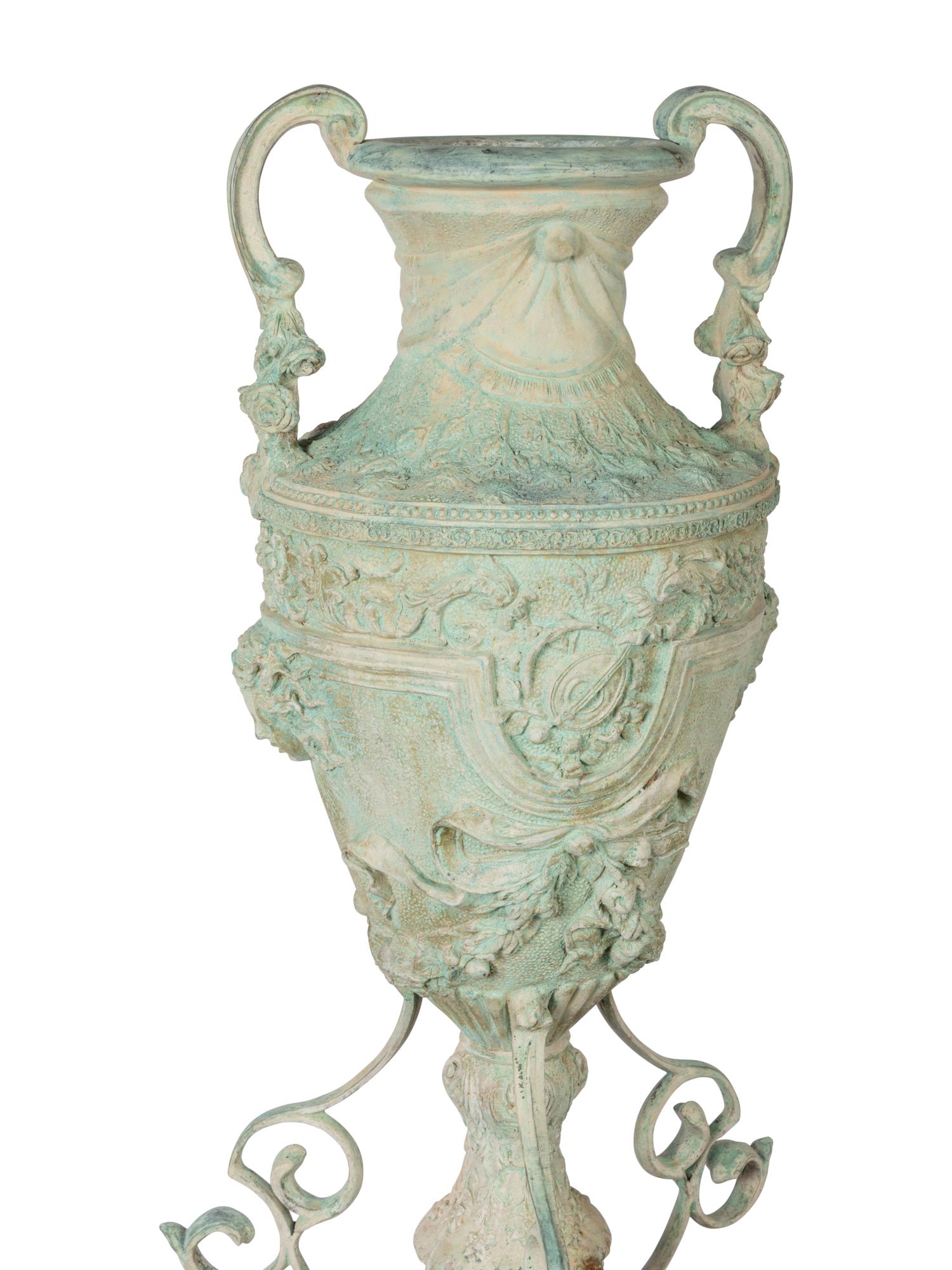 A Pair of Neoclassical Style Patinated Cast Metal or Bronze Urns
