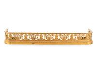 An Empire Style Gilt Bronze Fireplace Fender