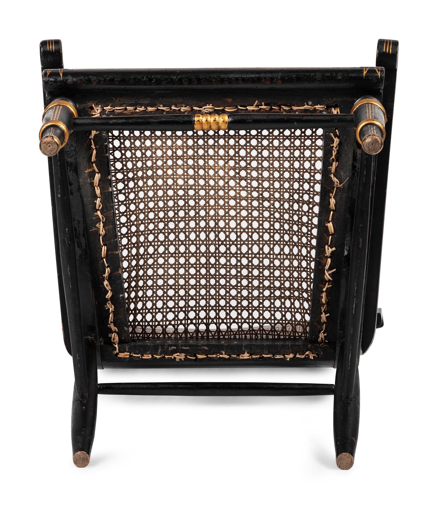 A Classical Carved, Painted and Parcel Gilt Wood Cane Seat Hitchcock Armchair