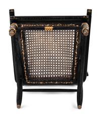 A Classical Carved, Painted and Parcel Gilt Wood Cane Seat Hitchcock Armchair