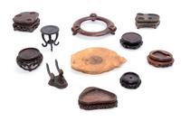 A Collection of Chinese Hardwood Stands Length of longest 7 1/2 inches.