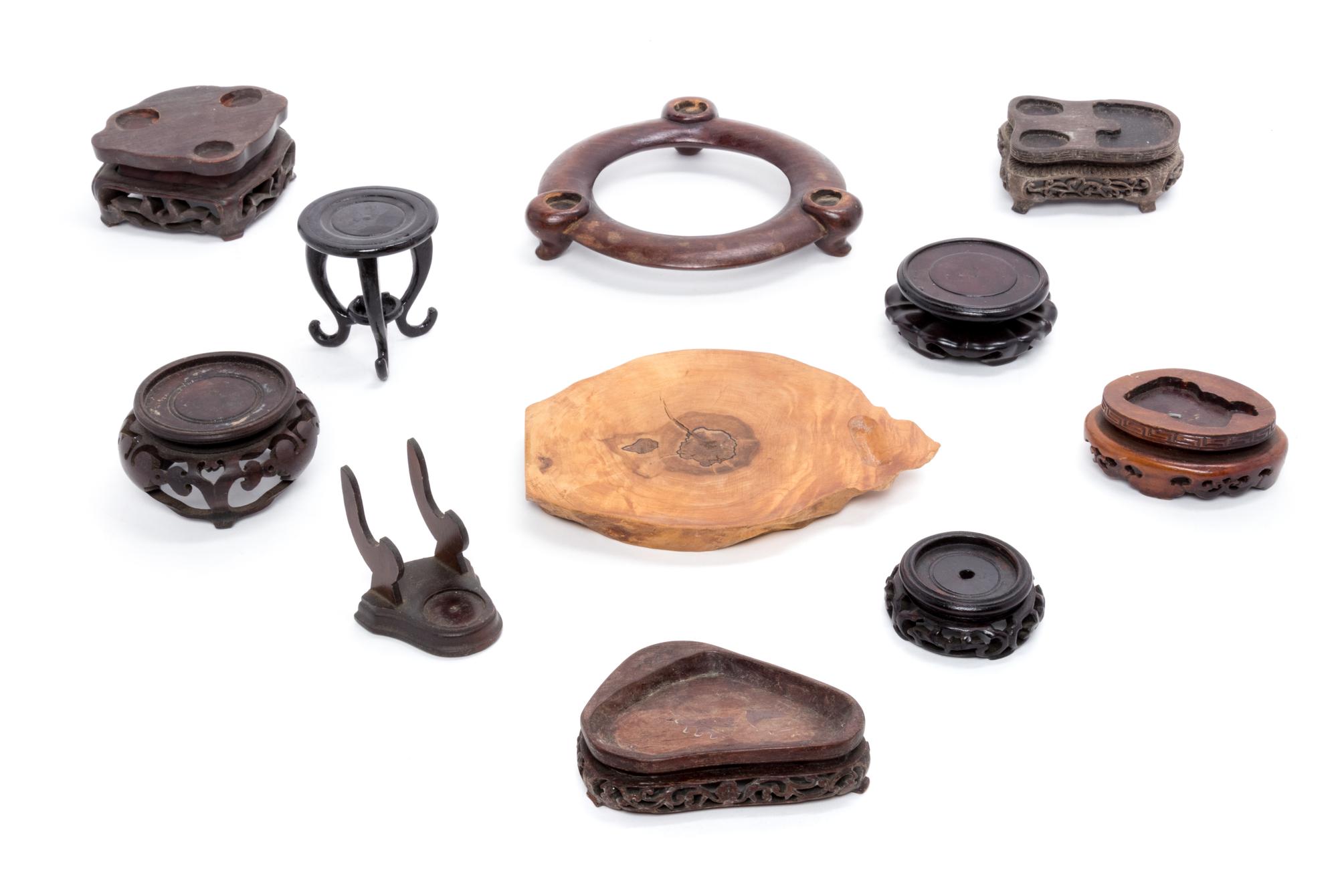 A Collection of Chinese Hardwood Stands Length of longest 7 1/2 inches.