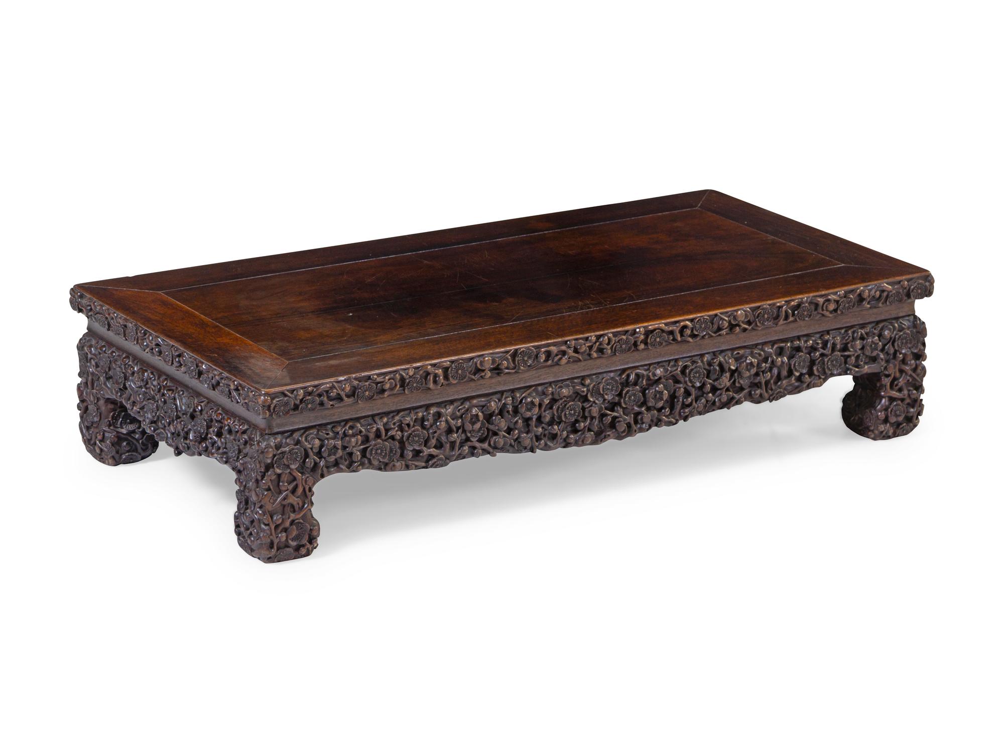 A Carved Hardwood Rectangular Stand