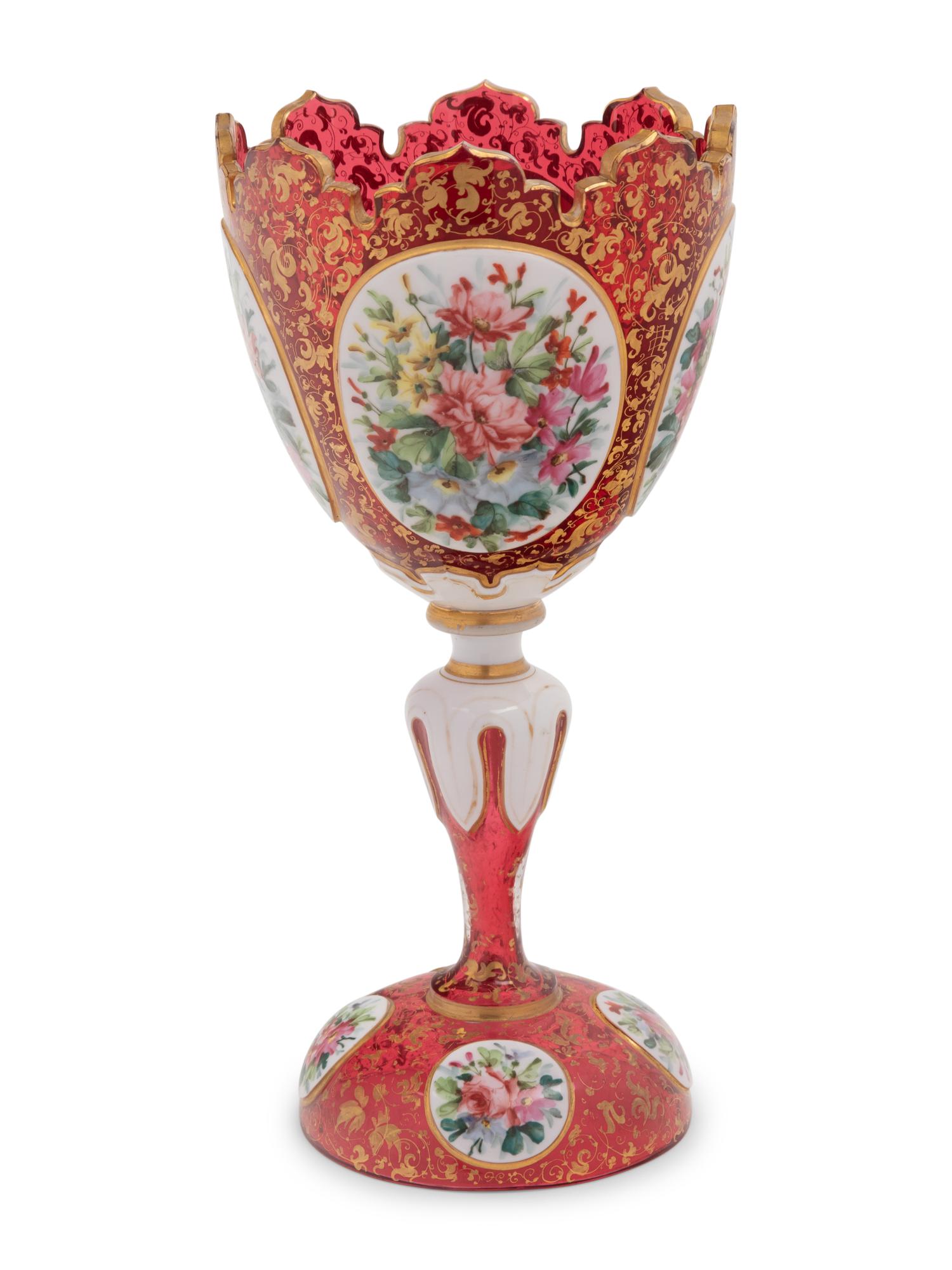 A Bohemian Gilt and Enameled Ruby Glass Goblet
