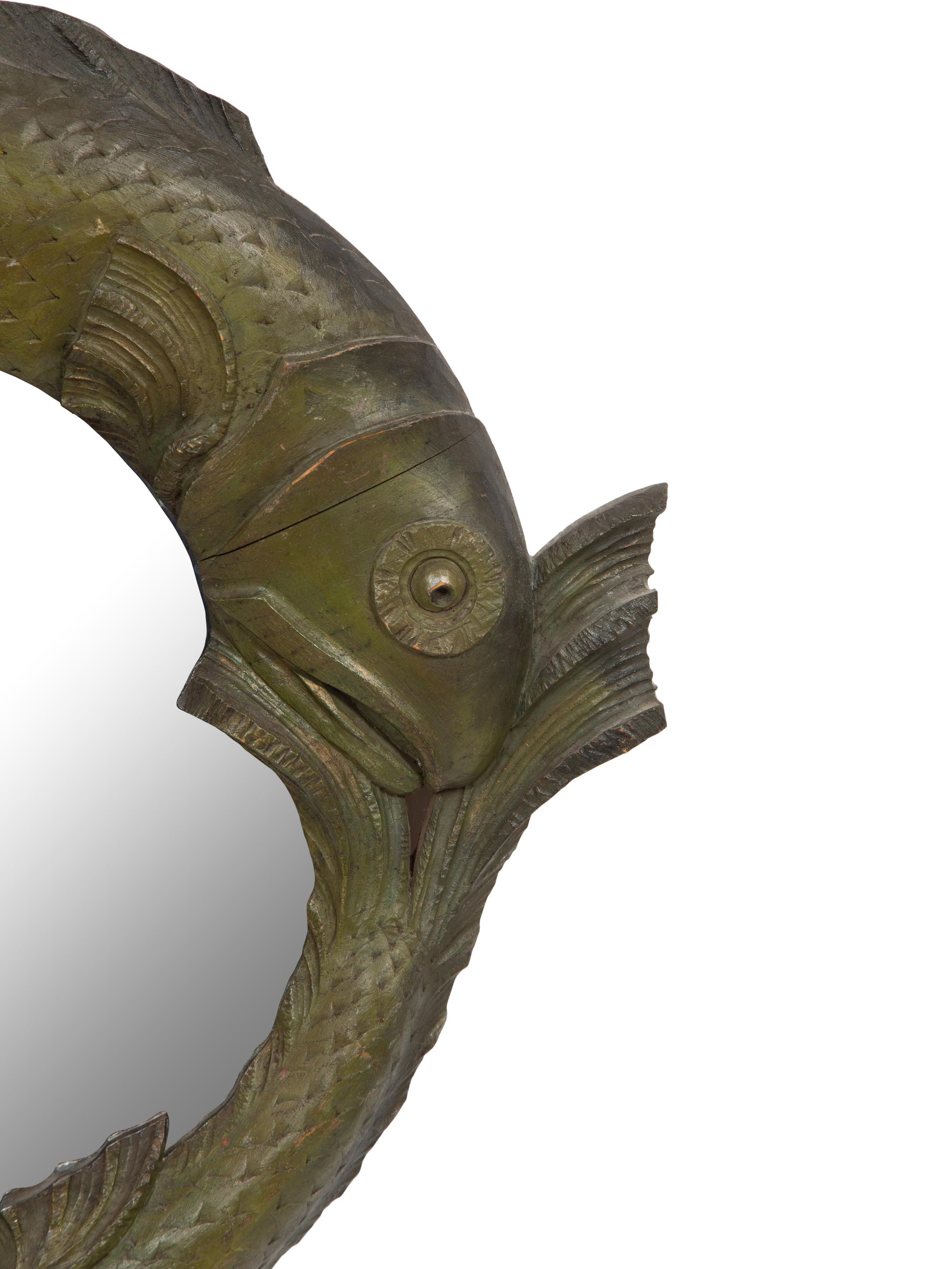 A Pair of Fish-Carved Wood Circular Mirrors
