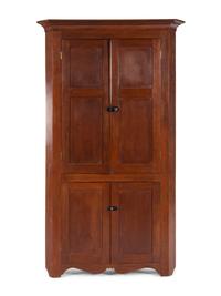A Federal Style Cherrywood Corner Cabinet